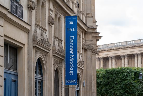 Vertical banner mockup on a classic building facade for outdoor advertising design presentation, Paris street scene.